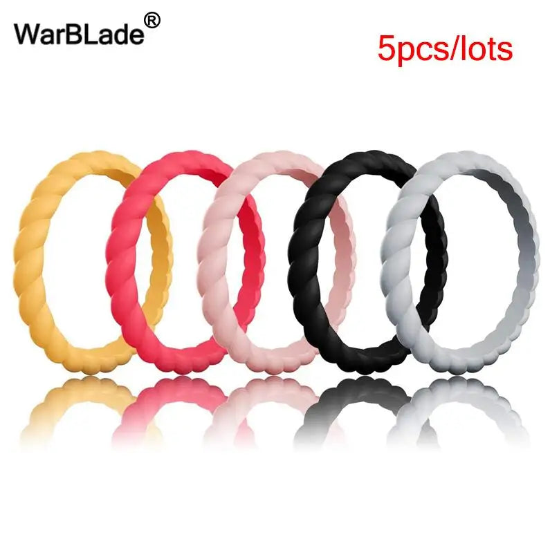 Five assorted colored braided silicone rings displayed in a row.
