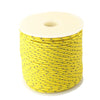 A spool of yellow high-visibility reflective paracord coiled on a white background.