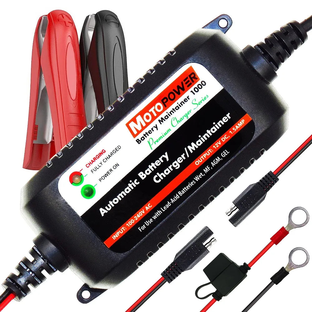A black automatic battery charger and maintainer device with various cables and battery components.