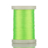 A spool of bright lime green braided polyester thread for guide tying and repairs.