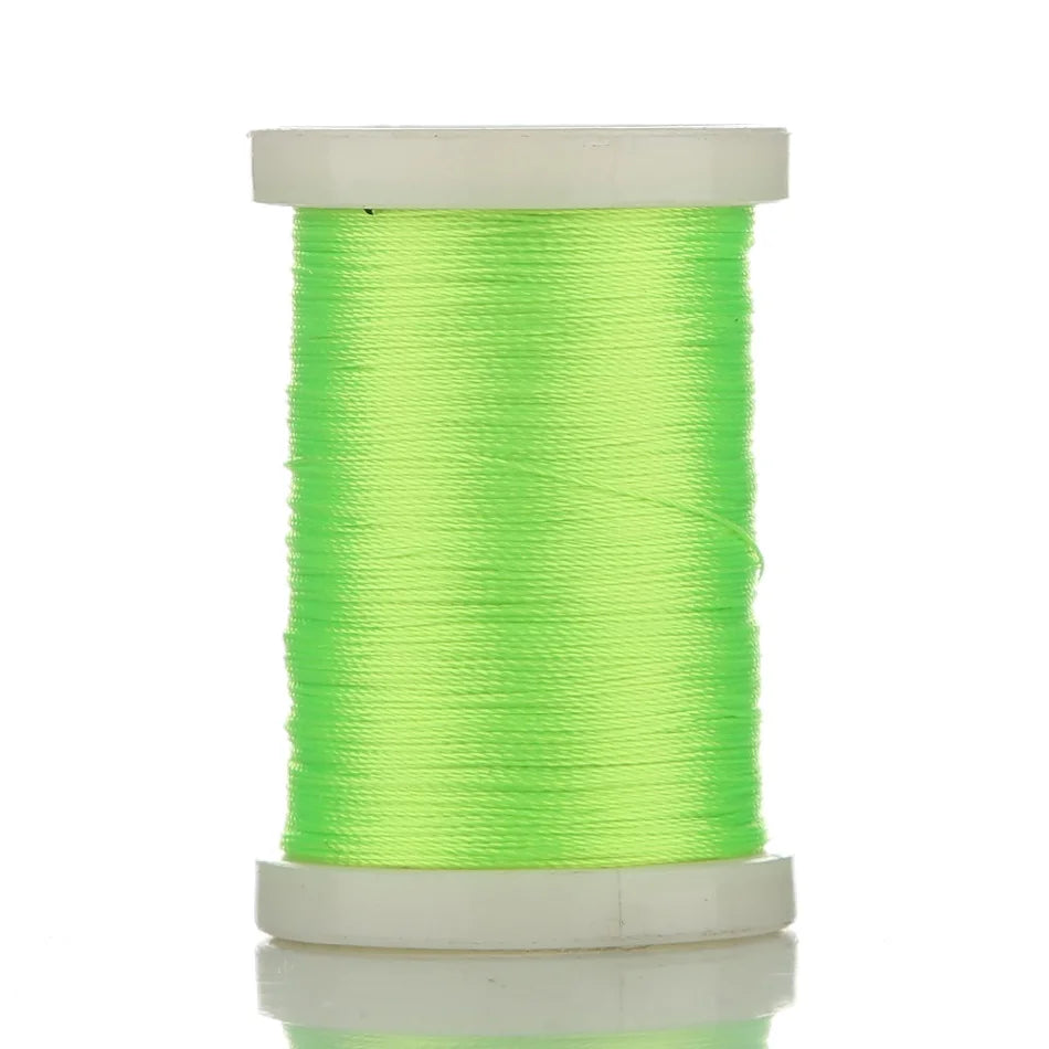 A spool of bright lime green braided polyester thread for guide tying and repairs.