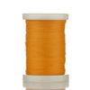 A spool of bright orange braided polyester thread for guide tying and repairs.