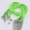 A bundle of bright lime green adjustable leather cord necklaces with silver clasps.