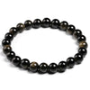 A stretch bracelet made of natural black gold obsidian gemstones.