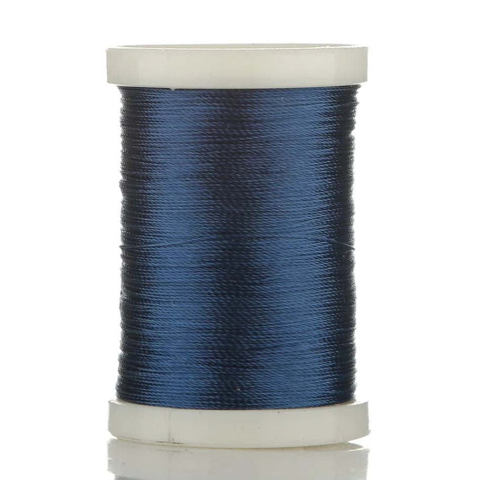 Spool of dark blue braided polyester thread for guide tying and repairs
