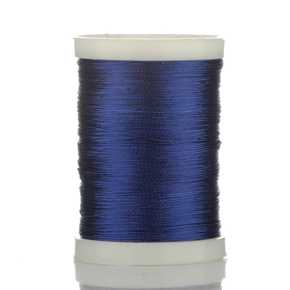 Spool of blue braided polyester thread for guide tying and repairs