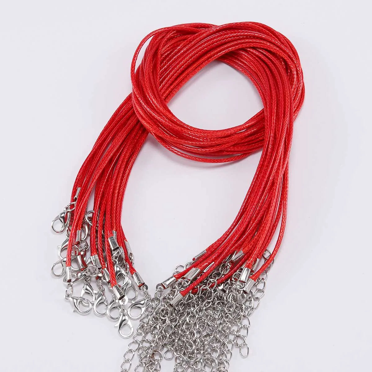 A bundle of red leather cord necklace with silver clasps.