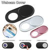 Various designs of a webcam cover including black, silver, and pink options shown with an unblocked and blocked camera view.