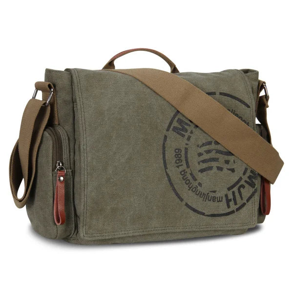 A olive green canvas messenger bag with brown leather straps and multiple pockets.