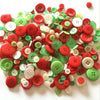 A close-up view of an assortment of small, round wooden buttons in various colors including red, green, white, and pink.