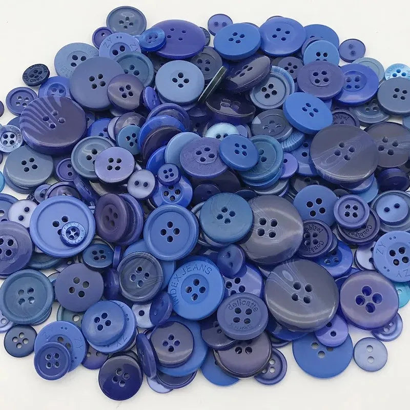 A pile of assorted purple and blue wooden buttons for sewing and crafts.