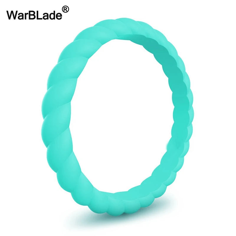 A close-up view of a light blue braided silicone ring.