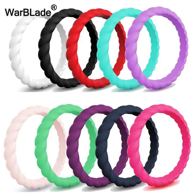 A collection of braided silicone rings in various colors including black, white, red, green, and purple.