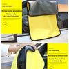 A yellow microfiber car wash towel is shown being used on a car interior, highlighting its thick and soft texture.