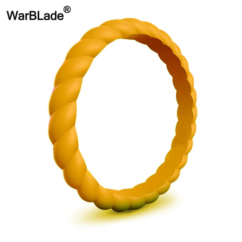 A close-up view of a braided silicone ring in a golden yellow color.