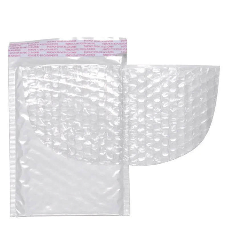 A stack of white waterproof foam paper envelopes is shown in a clear plastic packaging.