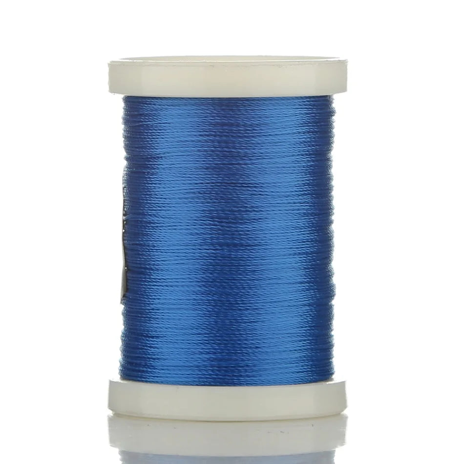 A spool of blue braided polyester rod wrapping thread for guide tying and repairs.