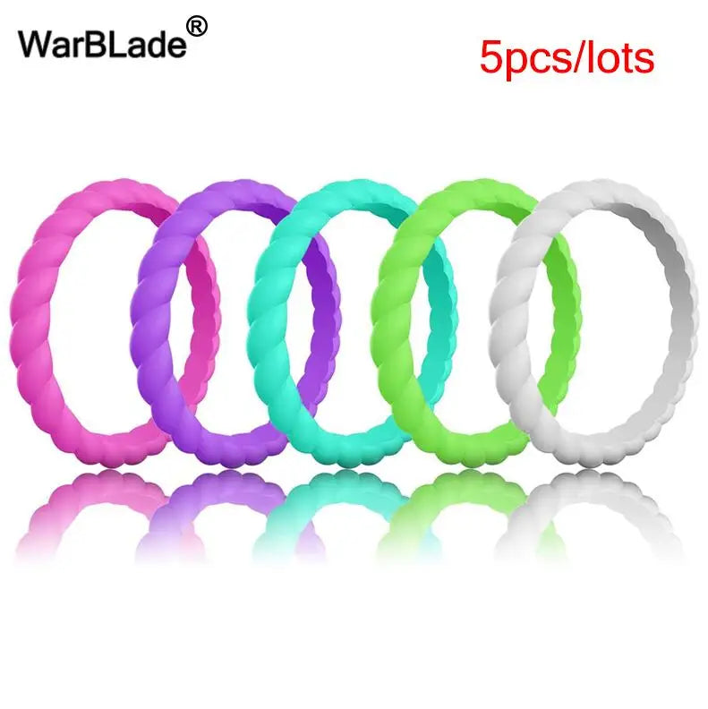 Five colored braided silicone rings in various shades of purple, green, and white.
