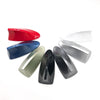 A collection of various colored car shark fin antenna covers, including red, blue, silver, and black.