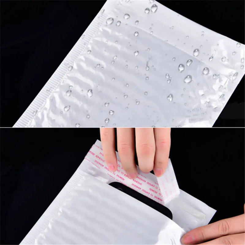 A hand is opening a white waterproof foam paper envelope, showing the clear plastic and embossed text.