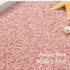 Close-up view of pink natural stone pebbles measuring 1-3mm for decorative use.