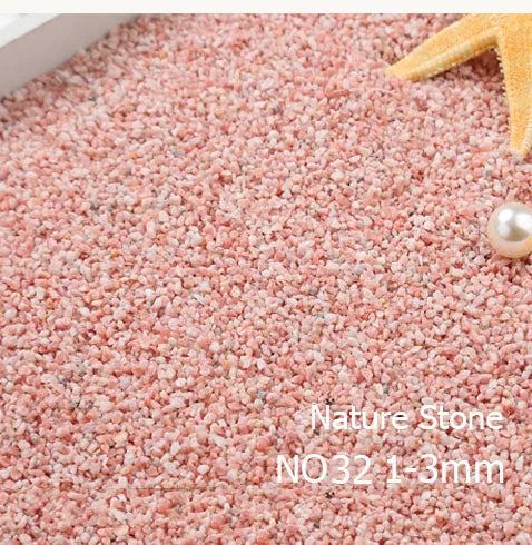 Close-up view of pink natural stone pebbles measuring 1-3mm for decorative use.