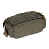A vintage canvas messenger bag in olive green with leather trim and multiple pockets.