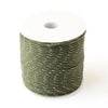 A roll of green high-visibility reflective paracord used for camping and DIY projects.