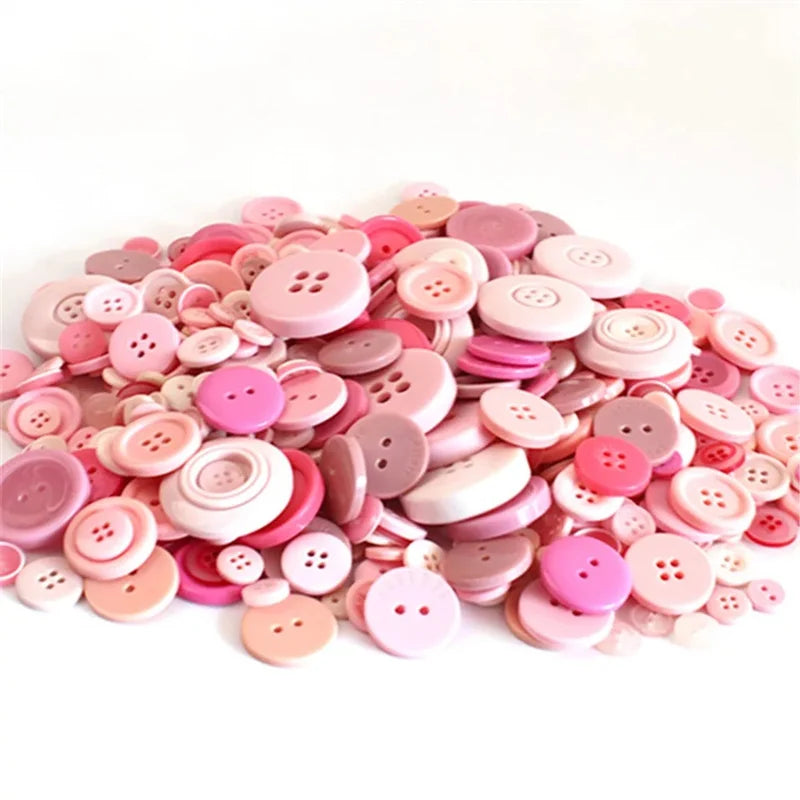 A pile of assorted pink and beige wooden buttons for sewing and crafts.