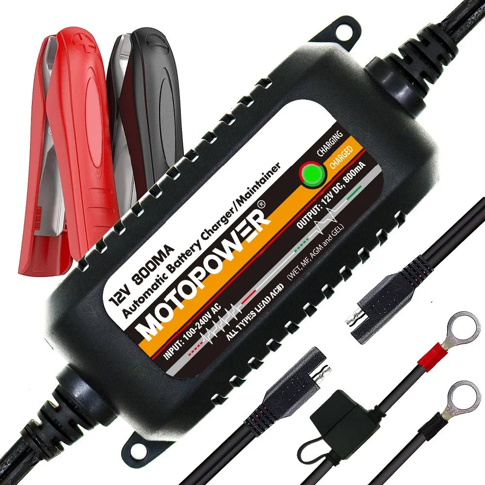 A black 12V automatic battery charger and maintainer with various cables and red battery components.