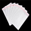 A multi-pack of white waterproof foam paper envelopes is shown in a fan-like arrangement.