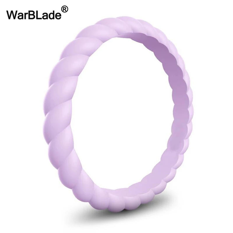 A close-up view of a lavender braided silicone ring.