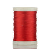 A spool of bright red braided polyester thread for guide tying and repairs.