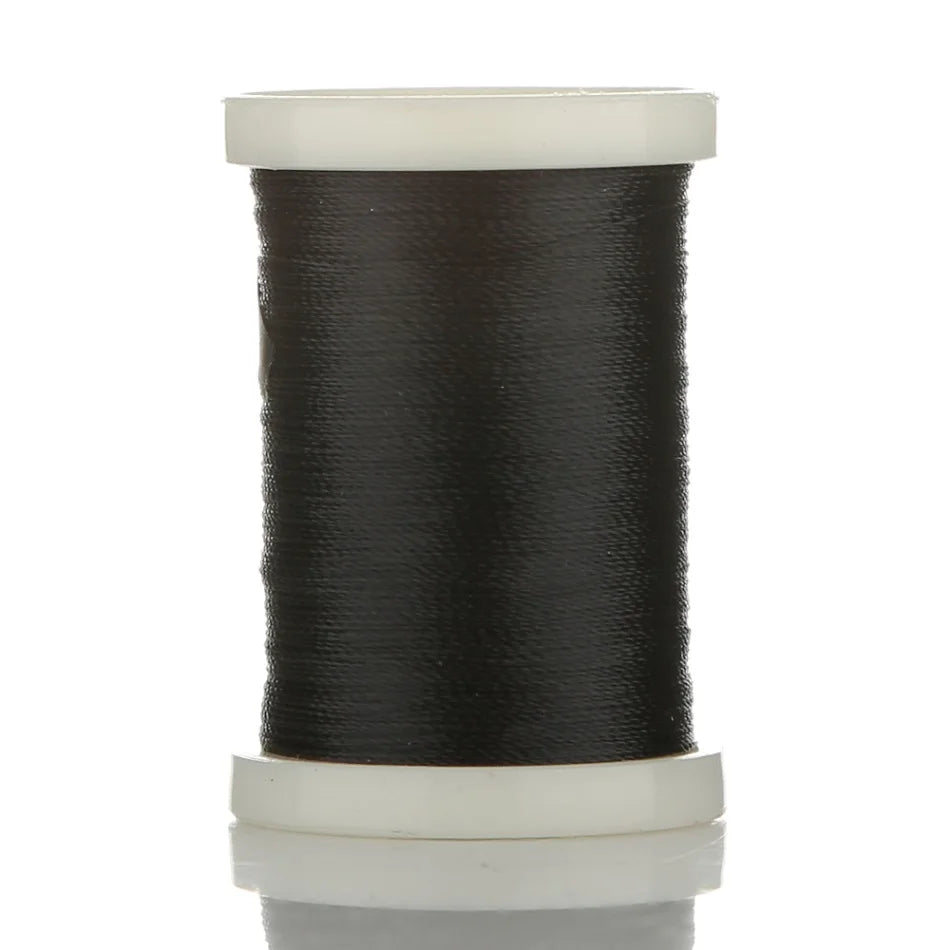 A spool of black braided polyester rod wrapping thread for guide tying and repairs.