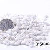 White decorative stone pebbles measuring 3-5mm for terrariums and aquariums