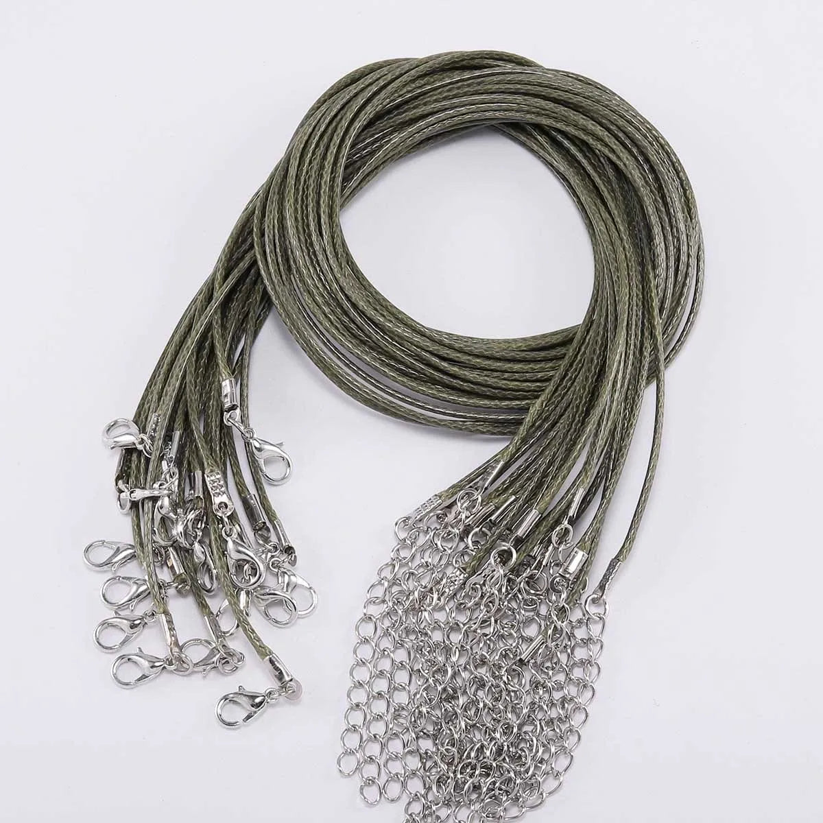 A coil of dark olive green adjustable leather cord necklace with silver clasps.