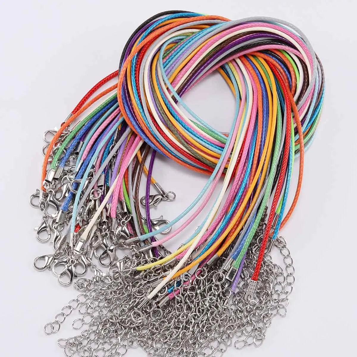 A bundle of multicolored leather cords and chains for making necklaces