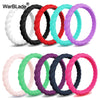 A collection of braided silicone rings in various colors including white, black, red, and purple.