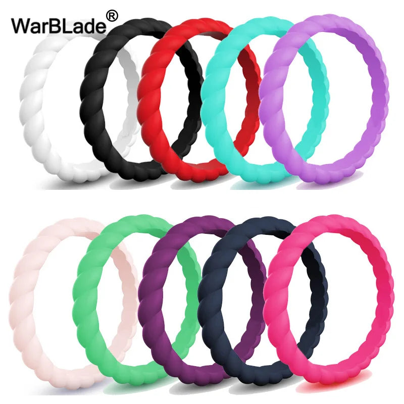 A collection of braided silicone rings in various colors including white, black, red, and purple.