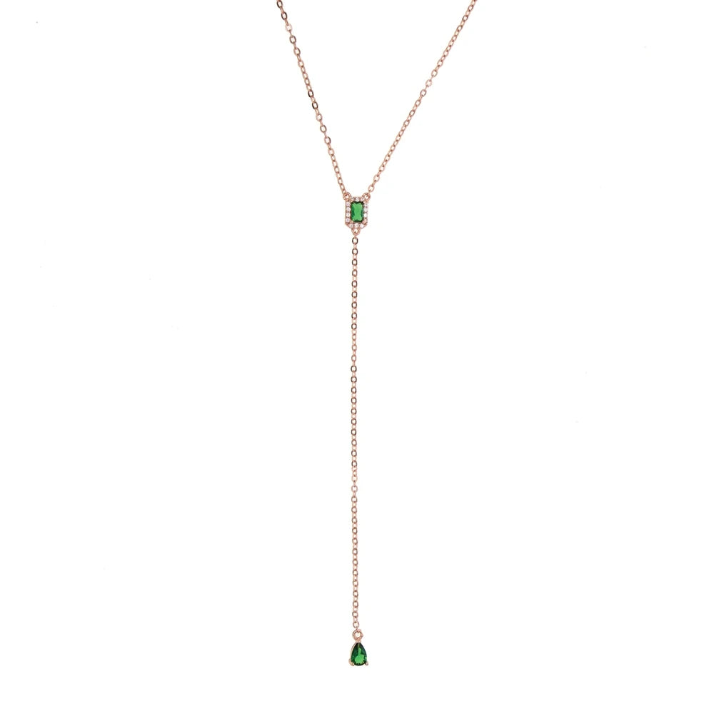 A delicate geometric teardrop lariat necklace featuring cubic zirconia stones on a gold-toned chain.