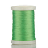 Green braided polyester rod wrapping thread on a spool for guide tying and repairs