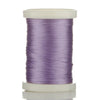 A spool of purple braided polyester thread for guide tying and repairs.