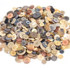A pile of assorted natural wood and ceramic buttons in various shades of brown, beige, and gray.