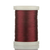 A spool of deep reddish-maroon braided polyester thread for guide tying and repairs.
