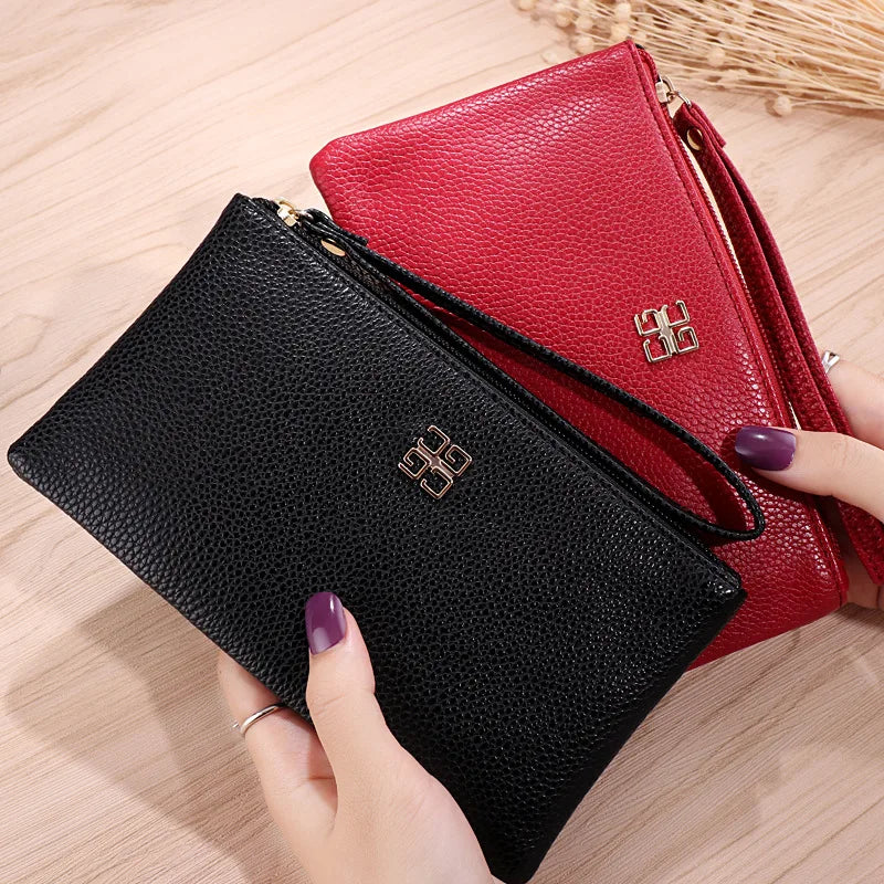 A black Litchi-Grain PU leather wallet is shown next to a red one, with gold logo details.