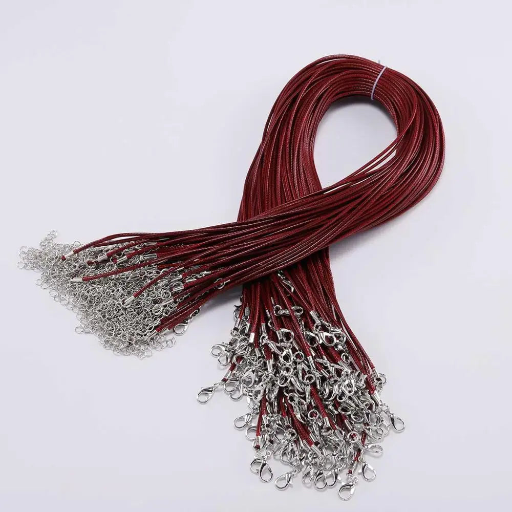 A bundle of adjustable leather cord necklaces in deep red and silver metal clasps.