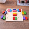 A wooden geometric shape sorting puzzle with various colored shapes arranged in compartments.