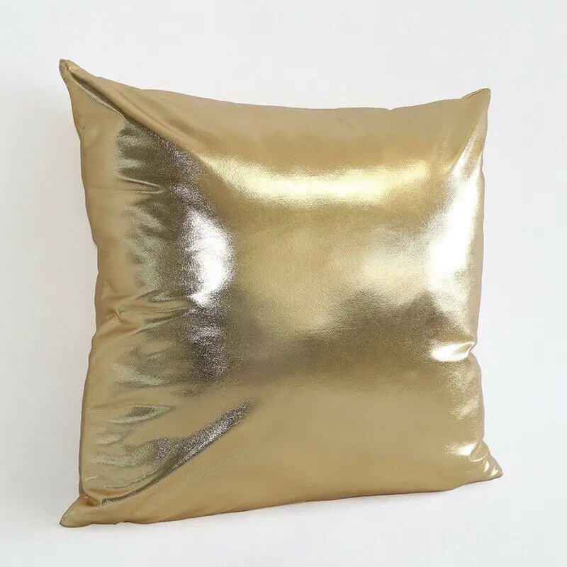 A square metallic gold decorative pillowcase with a shiny finish.
