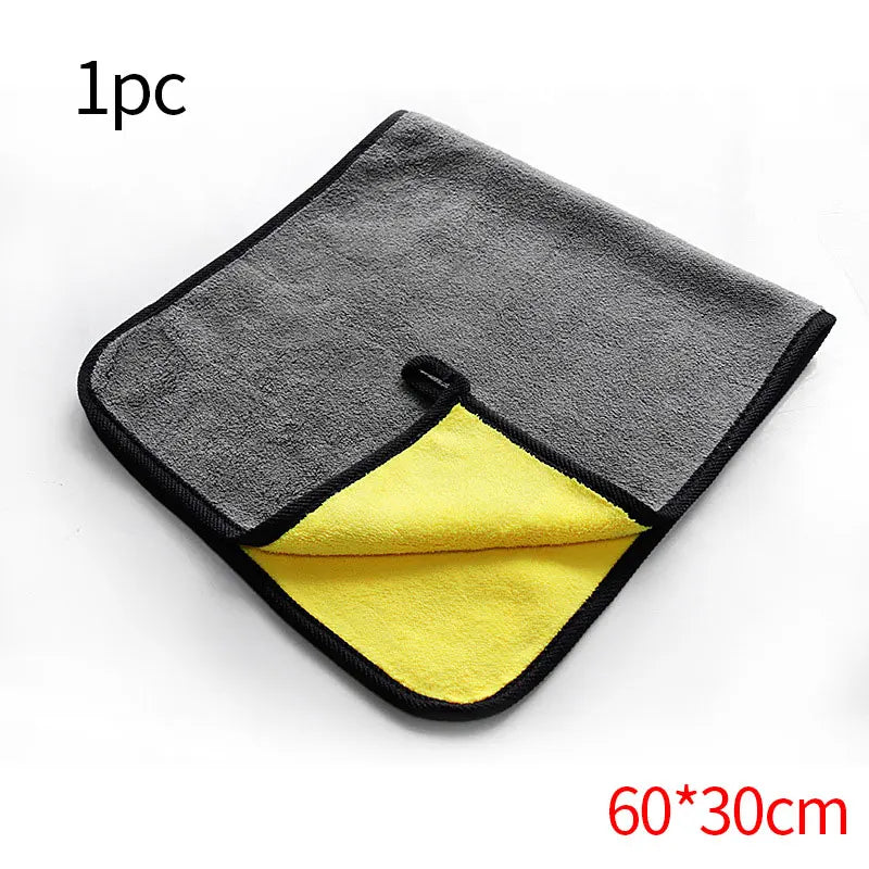 A square microfiber car care towel with a gray top and yellow bottom, measuring 60x30cm.