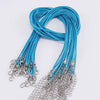A bundle of bright blue adjustable leather cord necklaces with silver clasps